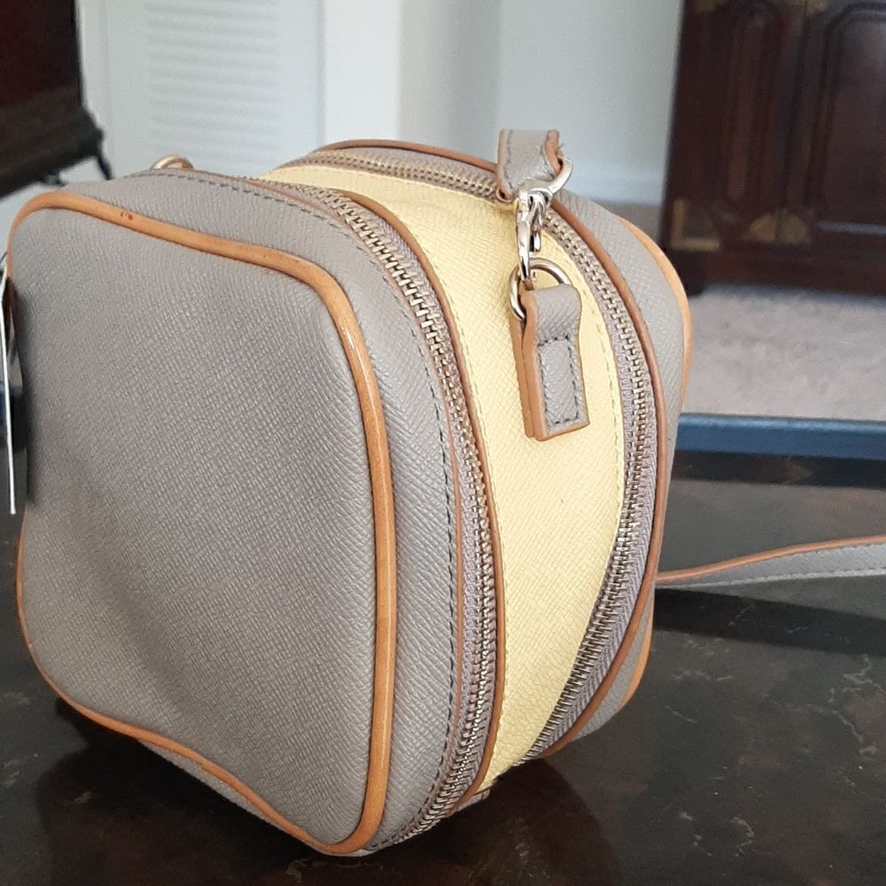NWT Sandra Robert's tan and yellow crossbody/wristlet bag